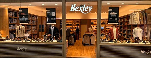 Bexley store front with window display of shoes and clothing