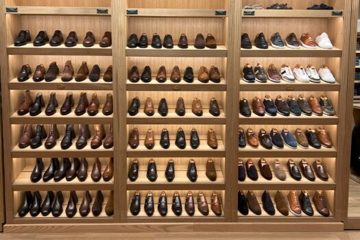 Display shelves with shoes at Bexley Valencia store