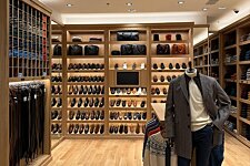 Interior of the Bexley store in Val d’Europe – Display of shoes, belts and elegant clothing