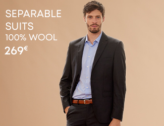 Man in a black separate suit, light blue shirt, and brown belt with the text 'Separate Suits 100% Wool 269€'