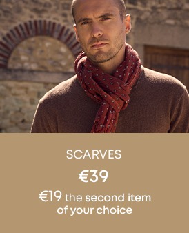 Man wearing a red patterned scarf