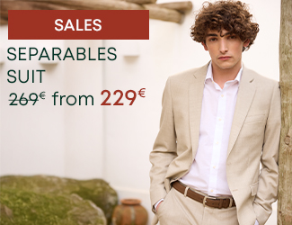 Man in a beige suit jacket and white shirt