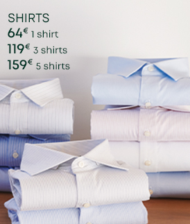 Folded dress shirts in soft tones