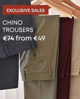 Men’s chinos in multiple colours displayed on hangers