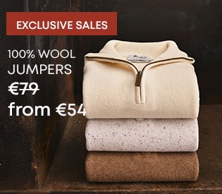 Stack of wool jumpers, zipped and classic styles on promotion.