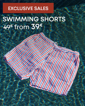 Striped swimming shorts floating in water