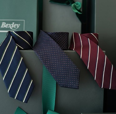 Three Bexley ties on gift boxes