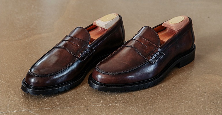 Brown grained leather loafers with a cleated sole