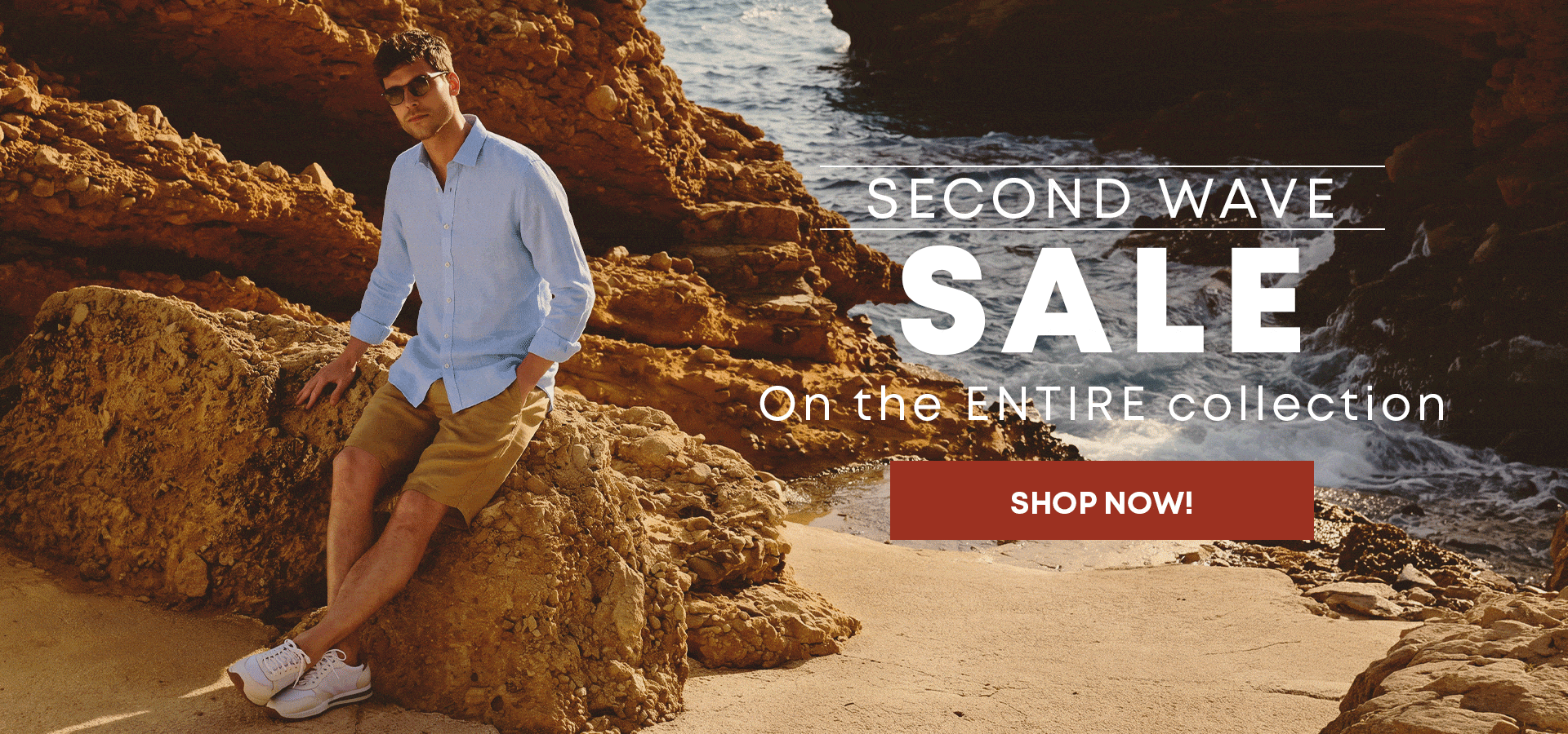 Man wearing a burgundy polo surrounded by loafers