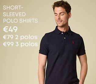 Man wearing a navy short-sleeved polo shirt