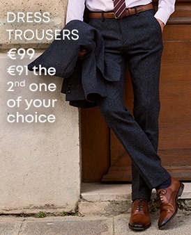 Man wearing charcoal grey dress trousers with brown leather shoes