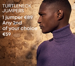 Man wearing a purple turtleneck pullover