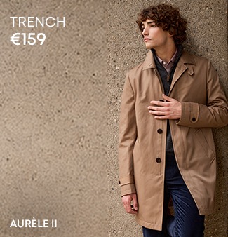 Man wearing a lightweight beige trench coat